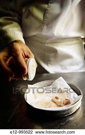 Greece, Athens, restaurant Spondi, chef Arnaud Bignon 2* chef, fixing a greek paella. View Large Photo Image Stock Image - Greece, Athens, restaurant Spondi, chef Arnaud Bignon 2* chef, fixing a greek paella.. Fotosearch