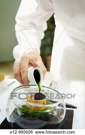 Greece, Athens, restaurant Spondi, chef Arnaud Bignon 2* chef, crude fish, rughetta, avruga. View Large Photo Image Stock Photograph - Greece, Athens, restaurant Spondi, chef Arnaud Bignon 2* chef, crude fish, rughetta, avruga.. Fotosearch