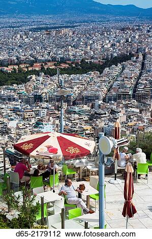 Greece, Central Greece Region, Athens, Lycabettus Hill, elevated city view with outdoor cafes. View Large Photo Image Stock Image - Greece, Central Greece Region, Athens, Lycabettus Hill, elevated city view with outdoor cafes.. Fotosearch