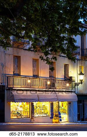 Stock Image - Greece, Central Greece Region, Delphi, souvenir shop selling reproductions of Ancient Greek items.. Fotosearch