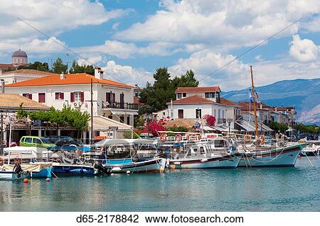 Stock Image - Greece, Central Greece Region, Galaxidi, view of town and harbor.. Fotosearch