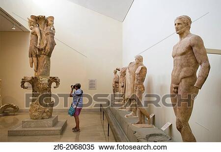Stock Photography - Greece Delphi famous Museum of Delphi with old Egyptian statues in 500 BC artifacts.. Fotosearch