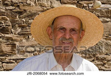 Greece Paros Cyclades old local man with donkey near Lefkes in mountains at his farm home 8. View Large Photo Image Picture - Greece Paros Cyclades old local man with donkey near Lefkes in mountains at his farm home 8.. Fotosearch