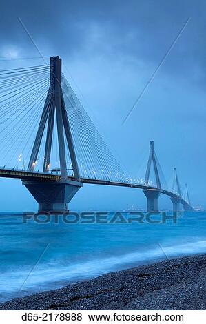 Greece, Peloponese Region, Gulf of Corinth, Patraa-area, Rio Antirio Bridge, dusk. View Large Photo Image Stock Photo - Greece, Peloponese Region, Gulf of Corinth, Patraa-area, Rio Antirio Bridge, dusk.. Fotosearch
