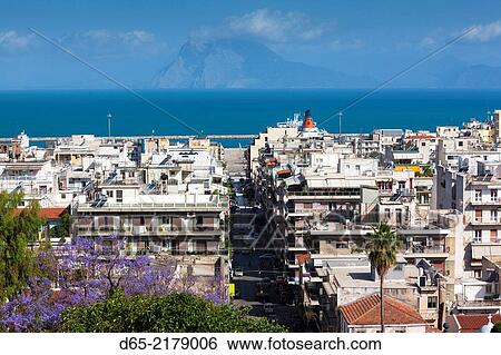 Greece, Peloponese Region, Patra, elevated city view over Agios Nikolaos Street. View Large Photo Image Stock Photograph - Greece, Peloponese Region, Patra, elevated city view over Agios Nikolaos Street.. Fotosearch