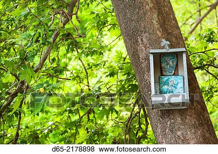 Greece, Thessaly Region, Makrinitsa, Pelion Peninsula, religious shrine on tree. View Large Photo Image Stock Photo - Greece, Thessaly Region, Makrinitsa, Pelion Peninsula, religious shrine on tree.. Fotosearch