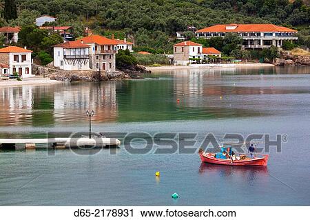 Greece, Thessaly Region, Milina, Pelion Peninsula, elevated town view with fishing boat. View Large Photo Image Stock Image - Greece, Thessaly Region, Milina, Pelion Peninsula, elevated town view with fishing boat.. Fotosearch