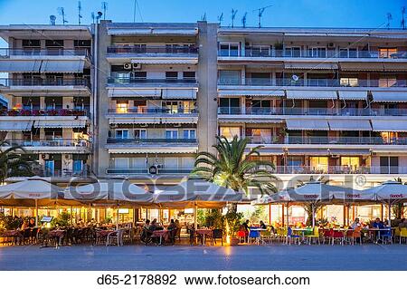 Greece, Thessaly Region, Pelion Peninsula, Volos, waterfront cafes, dusk. View Large Photo Image Stock Image - Greece, Thessaly Region, Pelion Peninsula, Volos, waterfront cafes, dusk.. Fotosearch