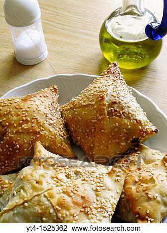 Greek Cuisine Kalitsounia Cheese and Spinach Pies, Chania, Crete View Large Photo Image Stock Image - Greek Cuisine Kalitsounia Cheese and Spinach Pies, Chania, Crete. Fotosearch