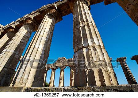 Greek Dorik columns at the ruins of Temple at Selinunte, Sicily View Large Photo Image Stock Photo - Greek Dorik columns at the ruins of Temple at Selinunte, Sicily. Fotosearch