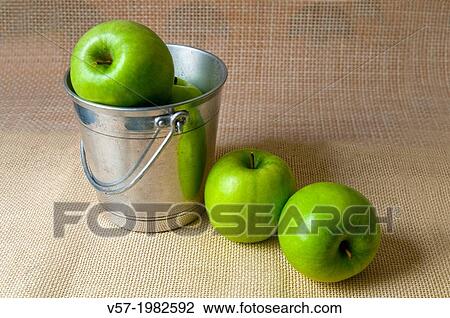 Stock Image - Green apples. Still life.. Fotosearch