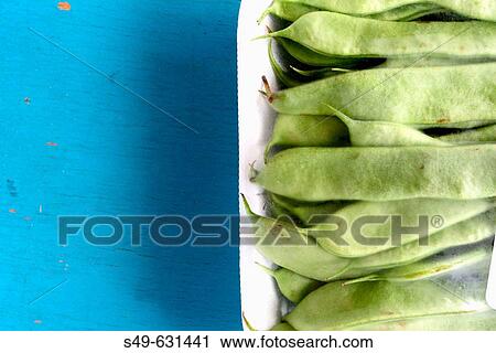 Green beans on wooden blue table View Large Photo Image Stock Image - Green beans on wooden blue table. Fotosearch