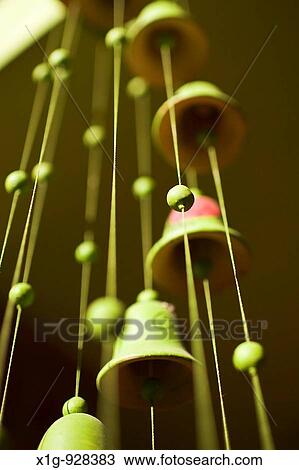 Green bell wind chimes hanging in Casa Oro in San Juan del Sur, Nicaragua View Large Photo Image Stock Image - Green bell wind chimes hanging in Casa Oro in San Juan del Sur, Nicaragua. Fotosearch