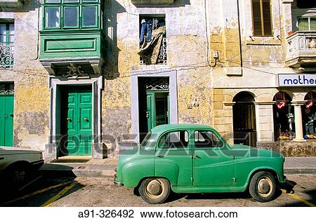 Green car, green balcony. Mdina. Malta. View Large Photo Image Stock Image - Green car, green balcony. Mdina. Malta.. Fotosearch