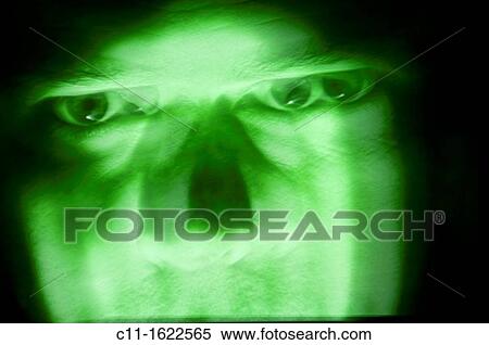 Stock Photography - green evil menacing face. Fotosearch