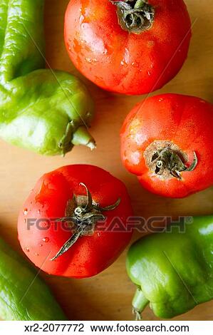 Green peppers and tomatoes View Large Photo Image Stock Image - Green peppers and tomatoes. Fotosearch