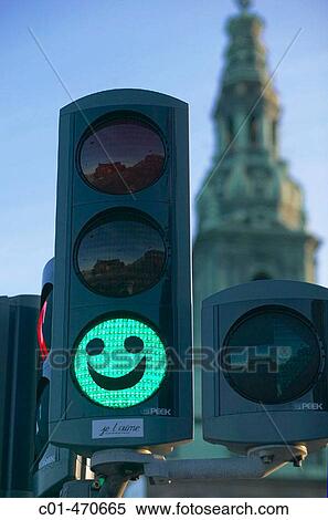 Green traffic light decorated with a funny face, Copenhagen. Denmark View Large Photo Image Stock Photography - Green traffic light decorated with a funny face, Copenhagen. Denmark. Fotosearch