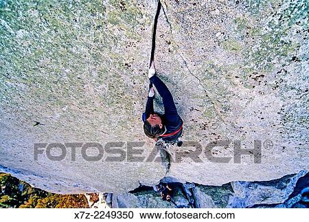 Greg Moore rock climbing a route called Pole Cat which is rated 5, 10 and located on the Sorcerers Stone at Castle Rocks State Park near the town of Almo in southern Idaho. View Large Photo Image Stock Image - Greg Moore rock climbing a route called Pole Cat which is rated 5, 10 and located on the Sorcerers Stone at Castle Rocks State Park near the town of Almo in southern Idaho.. Fotosearch