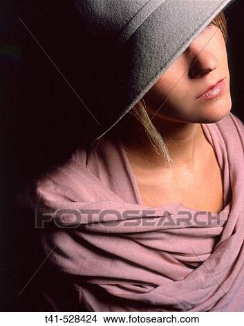 Grey felt hat and pink cashmere wrap. Young lady fashion shot. View Large Photo Image Picture - Grey felt hat and pink cashmere wrap. Young lady fashion shot.. Fotosearch