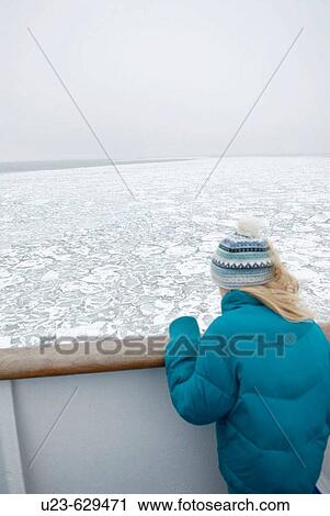 Stock Image - Gril at ferryboat deck.? land Islands. Finland. Fotosearch