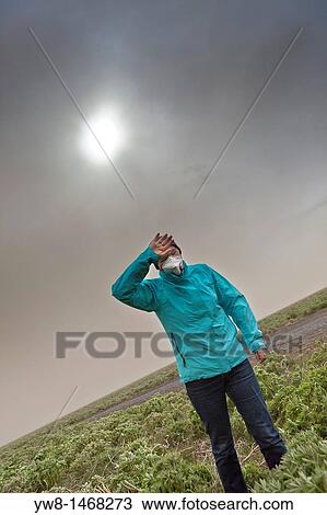 Grimsvotn Volcanic Eruption in the Vatnajokull Glacier, Iceland Woman wipes the ash from her eyes View Large Photo Image Stock Image - Grimsvotn Volcanic Eruption in the Vatnajokull Glacier, Iceland Woman wipes the ash from her eyes. Fotosearch
