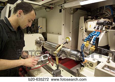 Grinding machines. Talleres MYL. Spindle manufacturing and repairing. Mendaro. Gipuzkoa, Euskadi, Spain View Large Photo Image Stock Image - Grinding machines. Talleres MYL. Spindle manufacturing and repairing. Mendaro. Gipuzkoa, Euskadi, Spain. Fotosearch