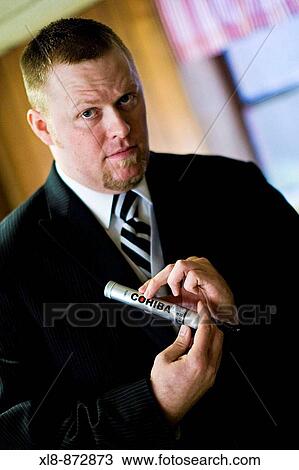 groom holding, smoking a cigar View Large Photo Image Stock Image - groom holding, smoking a cigar. Fotosearch