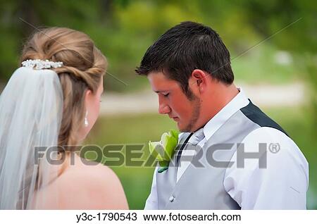 Groom praying at his wedding View Large Photo Image Stock Image - Groom praying at his wedding. Fotosearch