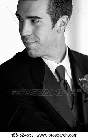 Stock Photo - Groomsman, man in suit. Fotosearch