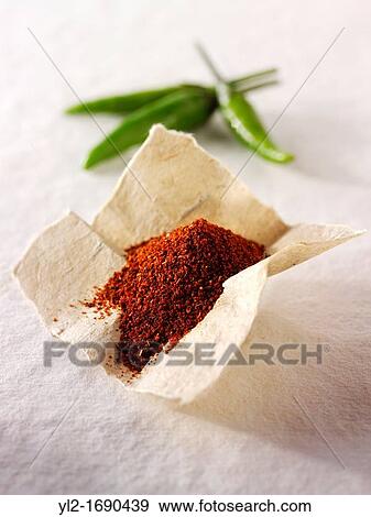 Stock Photo - Ground & fresh chilli. Fotosearch
