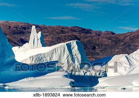 Grounded icebergs, Rode O Red Island, Scoresbysund, Northeast Greenland View Large Photo Image Picture - Grounded icebergs, Rode O Red Island, Scoresbysund, Northeast Greenland. Fotosearch