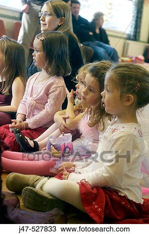 Group of 4 year old girls at a party, playing pass the parcel View Large Photo Image Stock Image - Group of 4 year old girls at a party, playing pass the parcel. Fotosearch