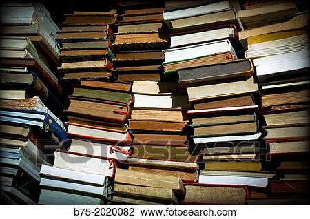 group of books stacked and disordered View Large Photo Image Stock Image - group of books stacked and disordered. Fotosearch