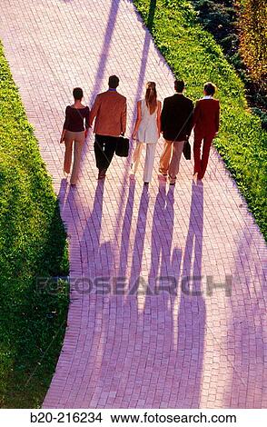 Group of businesspeople walking View Large Photo Image Picture - Group of businesspeople walking. Fotosearch