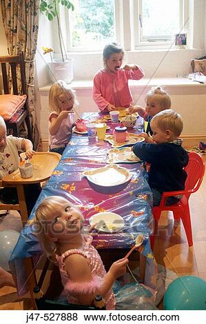 Group of children at a party View Large Photo Image Stock Photo - Group of children at a party. Fotosearch