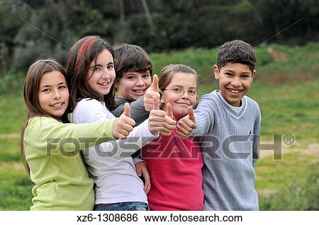 Group of children, thumbs up. Spain. View Large Photo Image Stock Photograph - Group of children, thumbs up. Spain.. Fotosearch