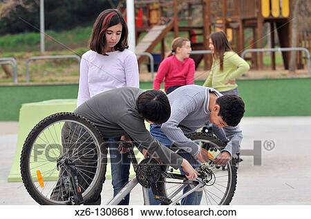 Group of children with bicycle View Large Photo Image Stock Image - Group of children with bicycle. Fotosearch