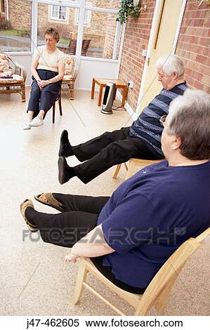 Group of geriactrics doing an exercise class View Large Photo Image Stock Photography - Group of geriactrics doing an exercise class. Fotosearch