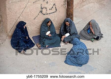 Group of Muslim women sitting and talking on the street, Yazd, Iran View Large Photo Image Stock Photo - Group of Muslim women sitting and talking on the street, Yazd, Iran. Fotosearch