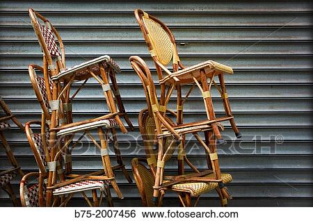 group of piled typical chairs in a Parisian bar in Paris, France, Europe View Large Photo Image Stock Photograph - group of piled typical chairs in a Parisian bar in Paris, France, Europe. Fotosearch