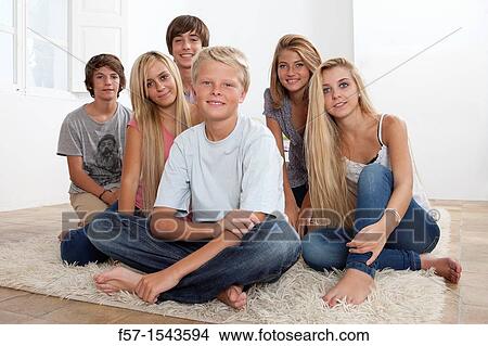 Group of teenagers looking to camera View Large Photo Image Picture - Group of teenagers looking to camera. Fotosearch