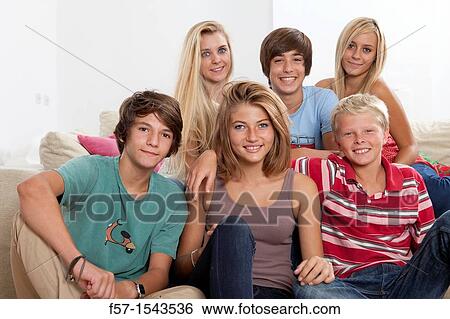 Group of teenagers looking to camera View Large Photo Image Stock Photograph - Group of teenagers looking to camera. Fotosearch