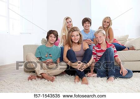 Group of teenagers looking to camera View Large Photo Image Stock Photography - Group of teenagers looking to camera. Fotosearch