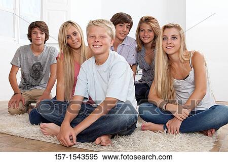 Stock Photography - Group of teenagers looking to camera. Fotosearch