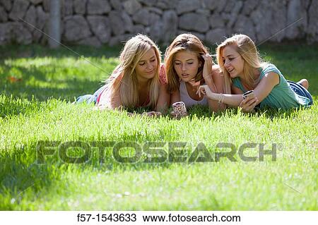 Group of Teenagers on their Blackberry? s View Large Photo Image Stock Image - Group of Teenagers on their Blackberry? s. Fotosearch