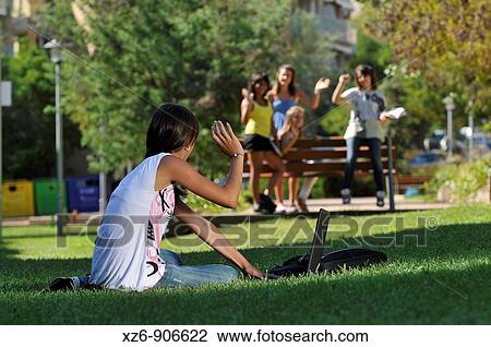 group of teenagers waving his hand in the park View Large Photo Image Stock Image - group of teenagers waving his hand in the park. Fotosearch