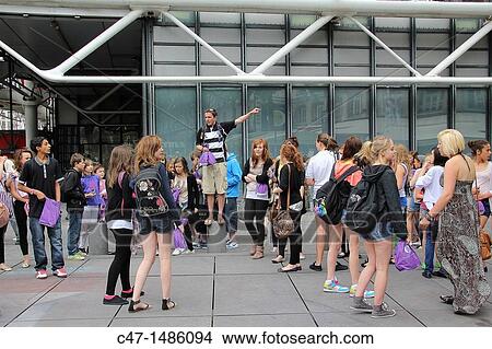 Group of tourits in front of the Centre George Pompidou building, Paris, France View Large Photo Image Picture - Group of tourits in front of the Centre George Pompidou building, Paris, France. Fotosearch