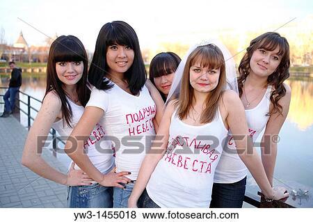 Stock Photo - Group of women outdoors. Bachelorette party. Russia.. Fotosearch