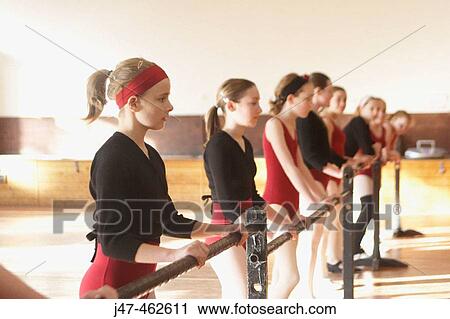 Group of youg teenage girls in ballet class, at a ballet bar. View Large Photo Image Stock Image - Group of youg teenage girls in ballet class, at a ballet bar.. Fotosearch