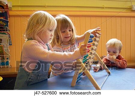 Group of young children playing together View Large Photo Image Stock Image - Group of young children playing together. Fotosearch